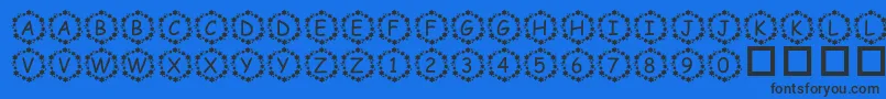 フォントPfSurroundedByStars – 黒い文字の青い背景