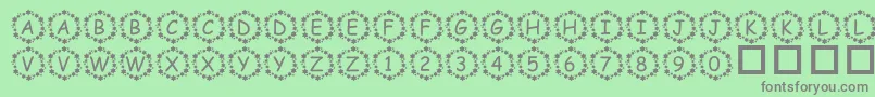 PfSurroundedByStars Font – Gray Fonts on Green Background