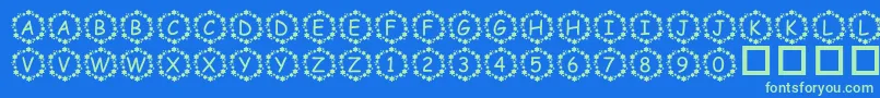 PfSurroundedByStars Font – Green Fonts on Blue Background