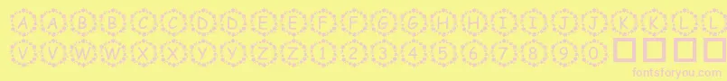 PfSurroundedByStars-fontti – vaaleanpunaiset fontit keltaisella taustalla