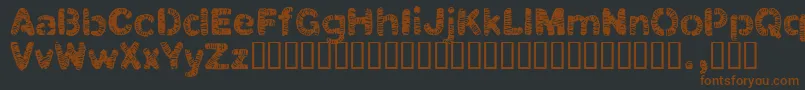 Clbtrial Font – Brown Fonts on Black Background