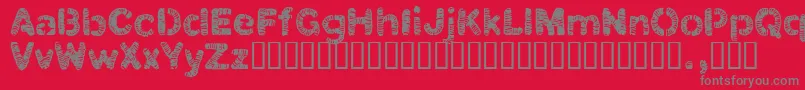 フォントClbtrial – 赤い背景に灰色の文字
