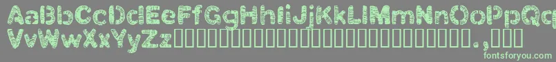 フォントClbtrial – 灰色の背景に緑のフォント