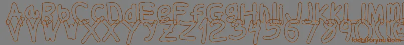 Fonte Thickerthanol – fontes marrons em um fundo cinza
