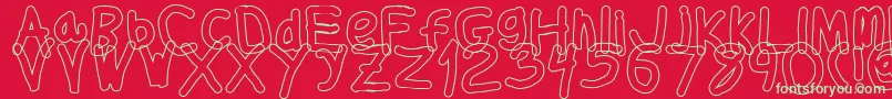 Fonte Thickerthanol – fontes verdes em um fundo vermelho