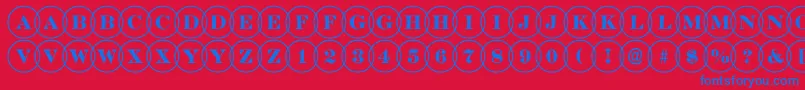 Czcionka DiscoserifovlRegular – niebieskie czcionki na czerwonym tle
