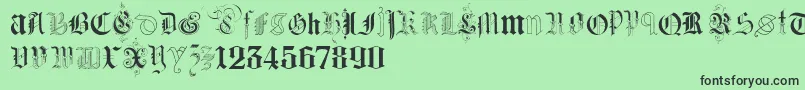 フォントKidnappedAtGermanLandsTwo – 緑の背景に黒い文字