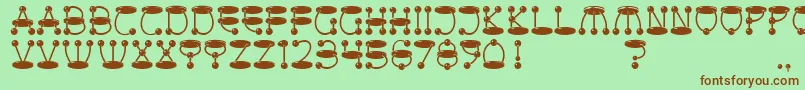 AtomicPicnic Font – Brown Fonts on Green Background