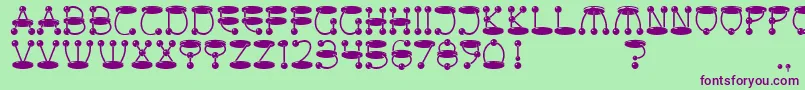 AtomicPicnic Font – Purple Fonts on Green Background