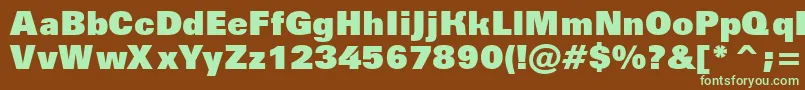 フォントAGroticextrablack – 緑色の文字が茶色の背景にあります。