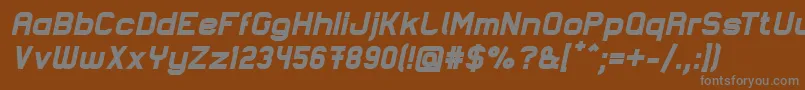 LastwaerkBlackOblique-fontti – harmaat kirjasimet ruskealla taustalla