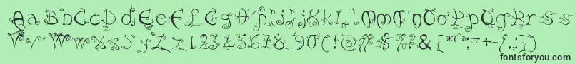 フォントEvernight – 緑の背景に黒い文字
