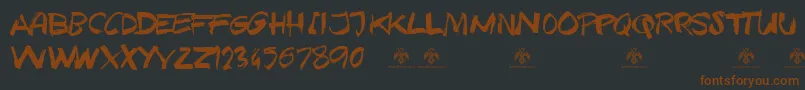 Czcionka TexasGrungeDemo – brązowe czcionki na czarnym tle
