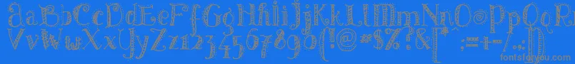 Pattd-Schriftart – Graue Schriften auf blauem Hintergrund
