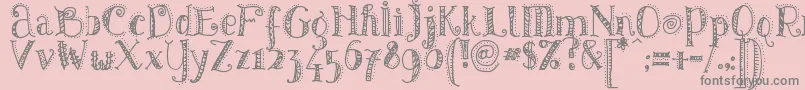 Pattd-fontti – harmaat kirjasimet vaaleanpunaisella taustalla