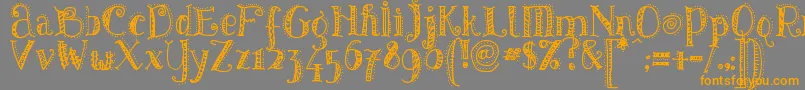 Pattd-Schriftart – Orangefarbene Schriften auf grauem Hintergrund