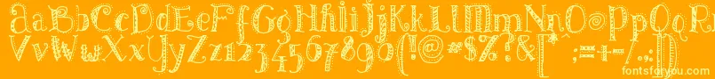 Pattd-Schriftart – Gelbe Schriften auf orangefarbenem Hintergrund