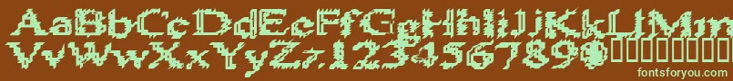 フォントHeats586 – 緑色の文字が茶色の背景にあります。