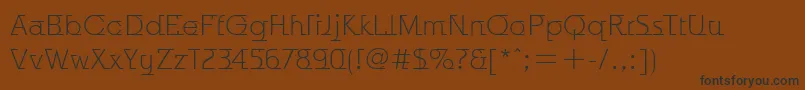fuente OdysseeItcTtLight – Fuentes Negras Sobre Fondo Marrón