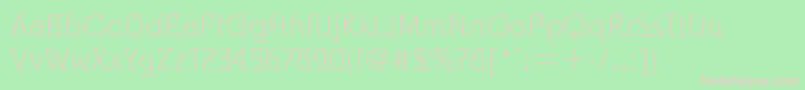 OdysseeItcTtLight-fontti – vaaleanpunaiset fontit vihreällä taustalla