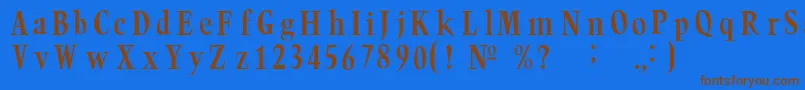 フォントTrumpc – 茶色の文字が青い背景にあります。