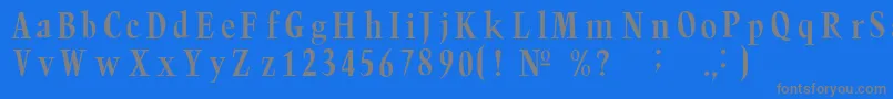 フォントTrumpc – 青い背景に灰色の文字