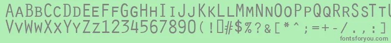 OratorRegular-fontti – harmaat kirjasimet vihreällä taustalla