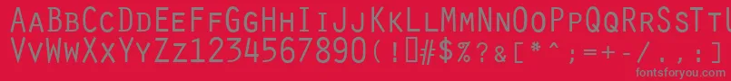 OratorRegular-fontti – harmaat kirjasimet punaisella taustalla