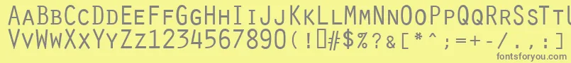 フォントOratorRegular – 黄色の背景に灰色の文字