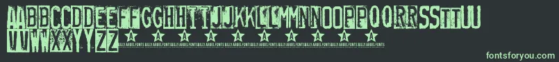 Rubberstamp Font – Green Fonts on Black Background