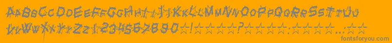 StarDustCondensedItalic-Schriftart – Graue Schriften auf orangefarbenem Hintergrund