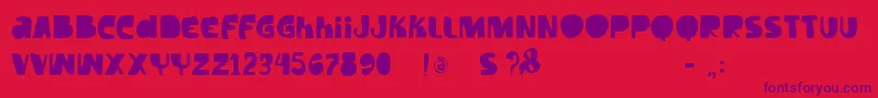 フォントVtkstilt – 赤い背景に紫のフォント