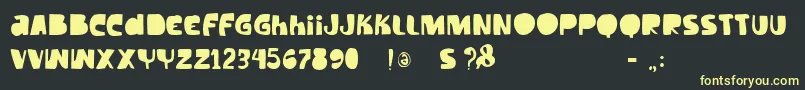Vtkstilt Font – Yellow Fonts on Black Background