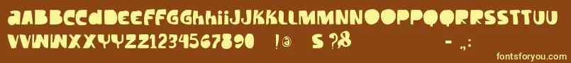 Vtkstilt Font – Yellow Fonts on Brown Background