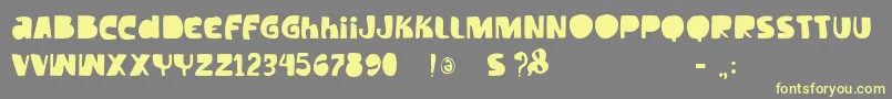 Vtkstilt Font – Yellow Fonts on Gray Background