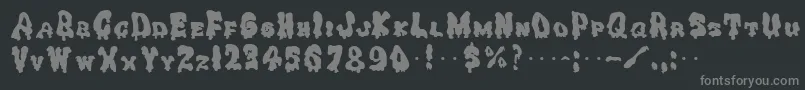 GhoulySolid Font – Gray Fonts on Black Background