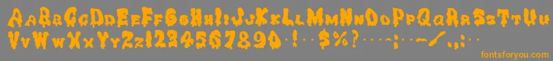 GhoulySolid Font – Orange Fonts on Gray Background