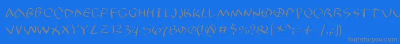 Petrifree Font – Gray Fonts on Blue Background