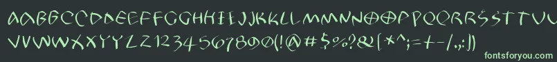 フォントPetrifree – 黒い背景に緑の文字