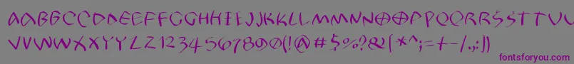 Petrifree Font – Purple Fonts on Gray Background