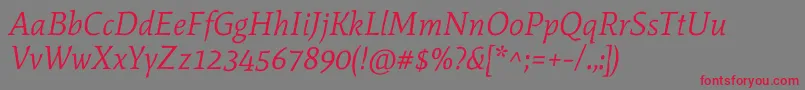 フォントMateItalic – 赤い文字の灰色の背景