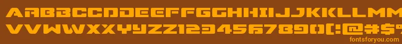 Supercommandoexpand Font – Orange Fonts on Brown Background