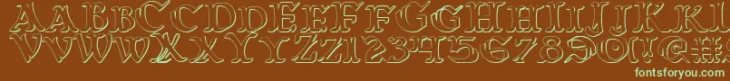 フォントWarasgard3D – 緑色の文字が茶色の背景にあります。