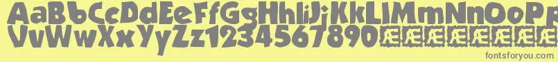StrandedBrk-fontti – harmaat kirjasimet keltaisella taustalla