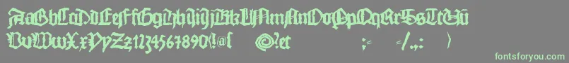More about Monkswriting Font Monkswriting Font – Green Fonts on Gray Background