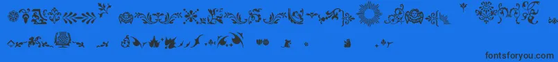 Fleurons Font – Black Fonts on Blue Background