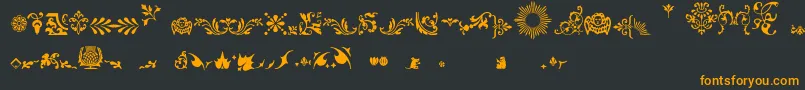 Fleurons Font – Orange Fonts on Black Background