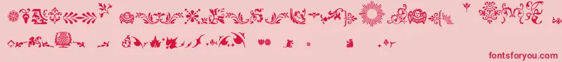 フォントFleurons – ピンクの背景に赤い文字