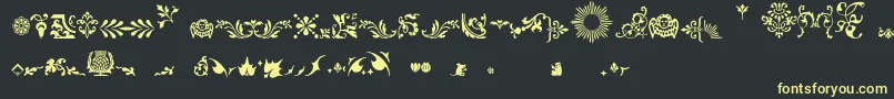 Fleurons Font – Yellow Fonts on Black Background