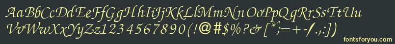 フォントZabriskiescriptItalic – 黒い背景に黄色の文字